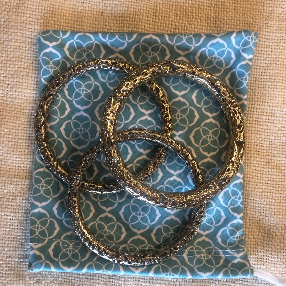 3 gold bangle brackets.